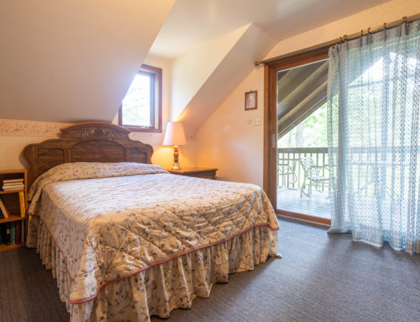 Upper bedroom with deck access