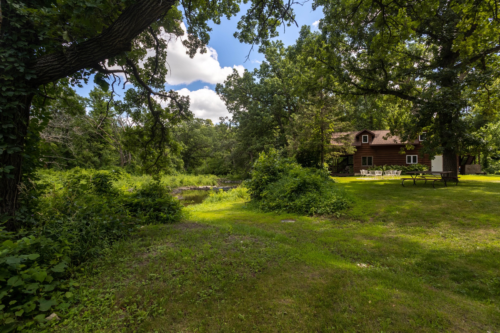 Brookside Cabin exterior along Cobb Creek